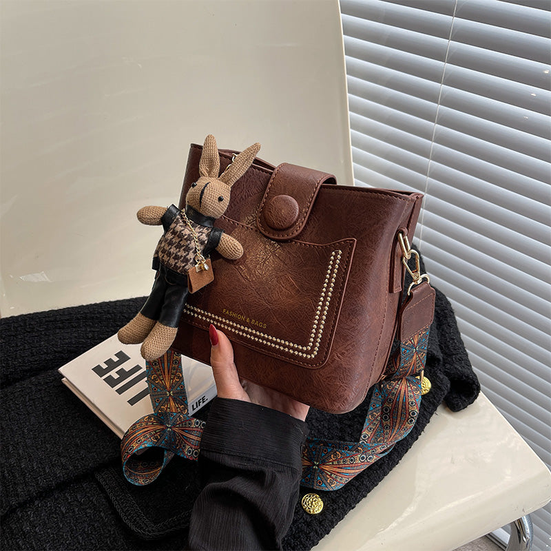 Vintage Style PU Leather Bucket Bag with Wide Patterned Strap & Optional Bunny Charm(caramel) - Image 5