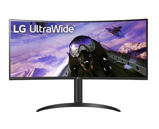 Modern desk setup with a sleek, vibrant monitor displaying a detailed image, highlighting the visual quality.