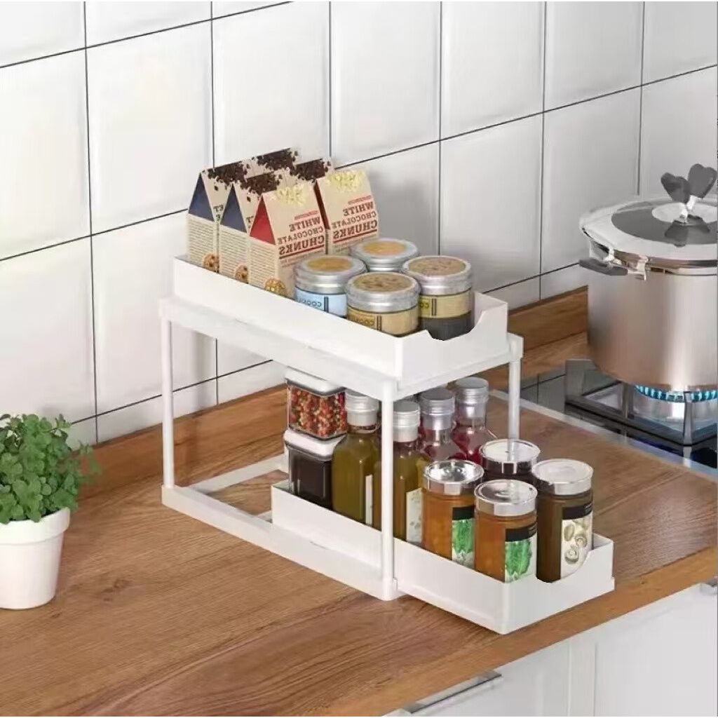 Two-tier pull-out storage rack. An organizational lifesaver for under the kitchen sink. Features adjustable shelves for easy storage of bottles and jars. In a sleek, modern design. Perfect as a kitchen shelf, bathroom organizer, or household storage solut - Image 7