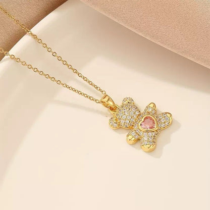 A delicate and adorable pink heart-shaped bear pendant copper necklace, adorned with synthetic zirconia, paired with a stainless steel chain, decorated with synthetic zirconia, perfect as a daily jewelry gift or a sweet and cute party accessory.（gold））