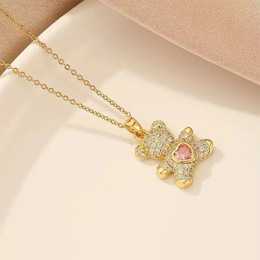 A delicate and adorable pink heart-shaped bear pendant copper necklace, adorned with synthetic zirconia, paired with a stainless steel chain, decorated with synthetic zirconia, perfect as a daily jewelry gift or a sweet and cute party accessory.（gold））