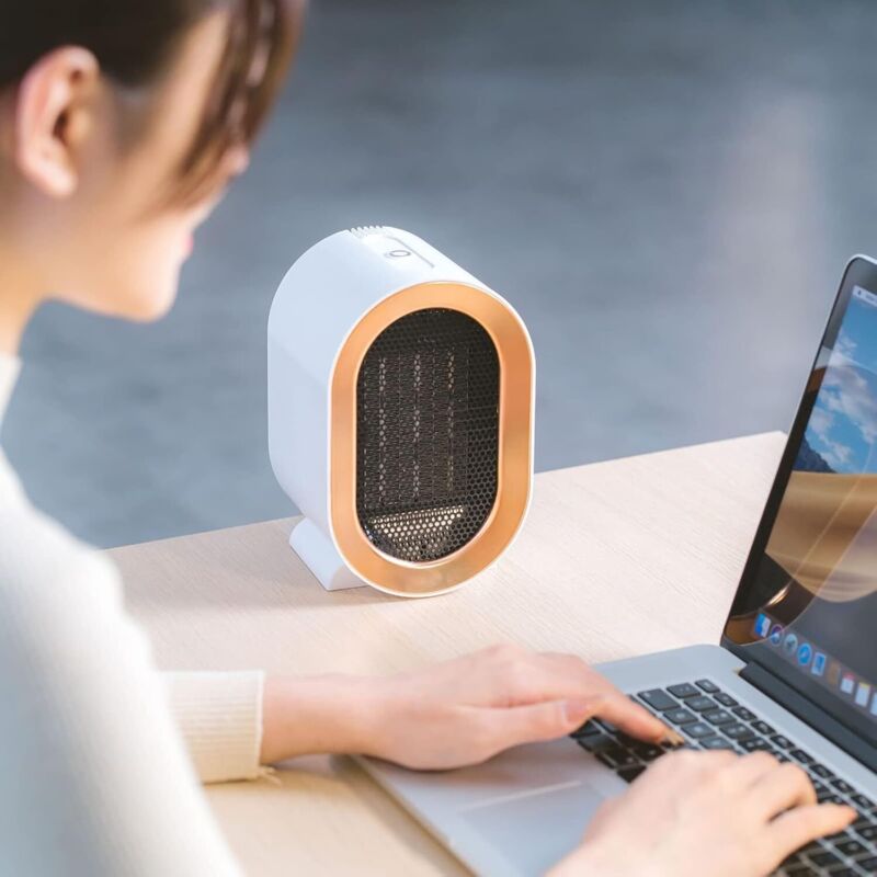 1200W ceramic PTC electric fan heater, two temperature settings, overheat protection, rapid heating, quiet operation, energy saving. - Image 2
