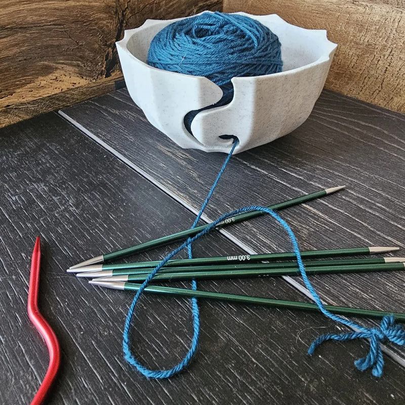 A 3D-printed yarn bowl to accompany your knitting and crochet time. White. - Image 3