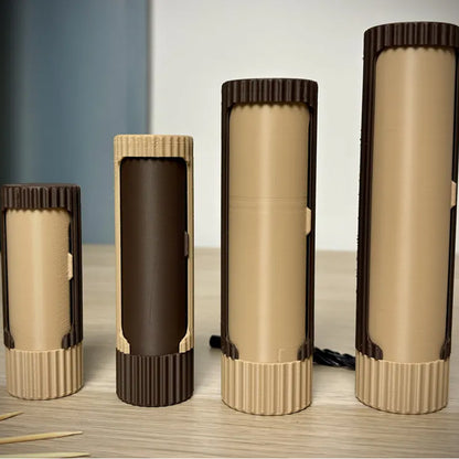 Compact 3D-printed rotating organizer capsule, 1.3 inches long x 4.1 inches high. - Image 2