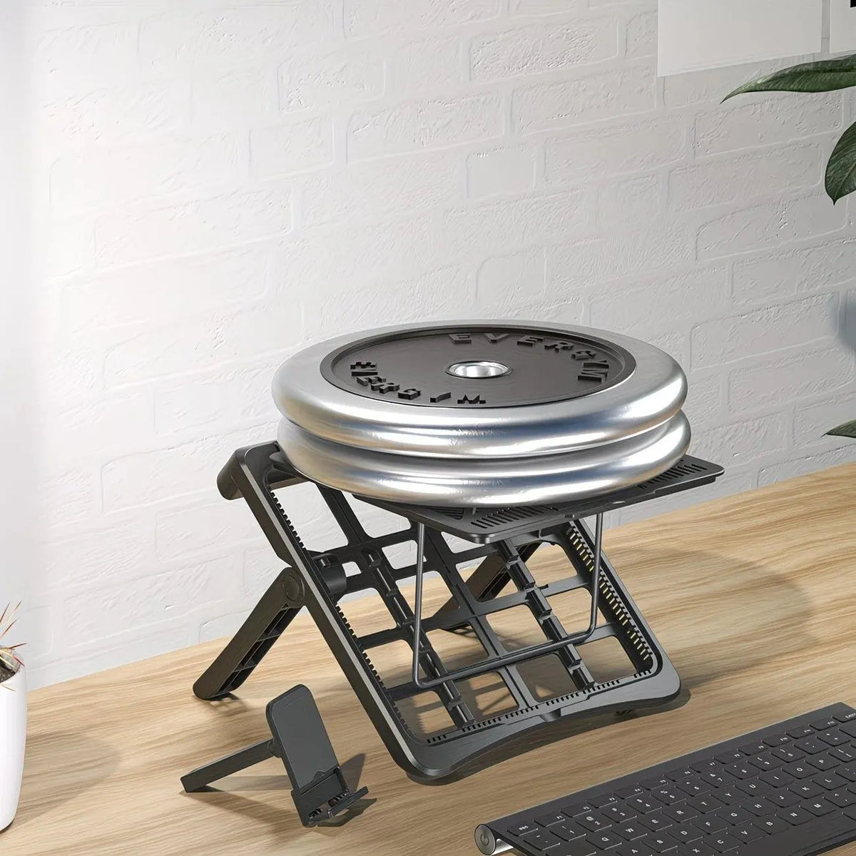 Adjustable laptop stand, designed for 17.3-inch laptops, a portable stand that allows for height adjustment on the desk, and comes with a dedicated phone holder. - Image 5