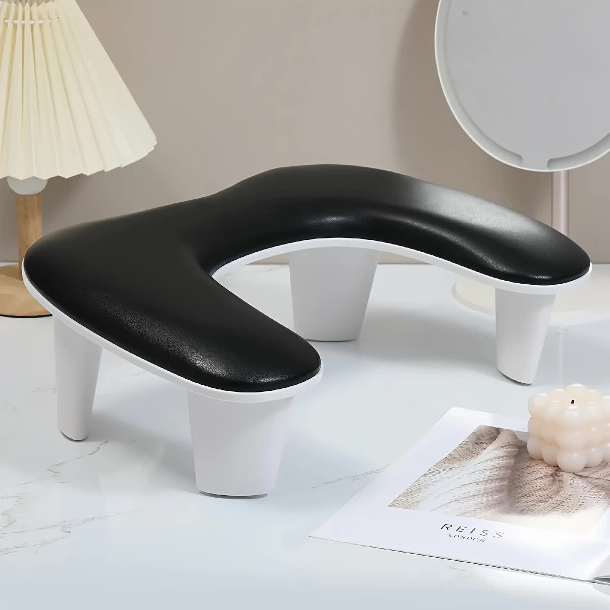 Grey This handheld nail care device integrates a U-shaped pillow and comes with a portable detachable stand. Designed with an inclined PU material and a sturdy base, it is crafted for both comfort and portability. - Image 5