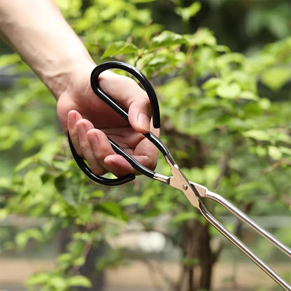 Long, sturdy, and heat-resistant charcoal tongs for grilling food. Made of stainless steel, these portable tongs are suitable for outdoor grilling, charcoal, and fire pits. - Image 6