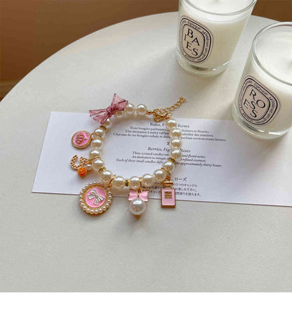 Pink 4-PCS Pearl Charm Pet Necklace - Adjustable Bowknot Collar for Small Dogs & Cats (L: 30+5CM) - Image 3