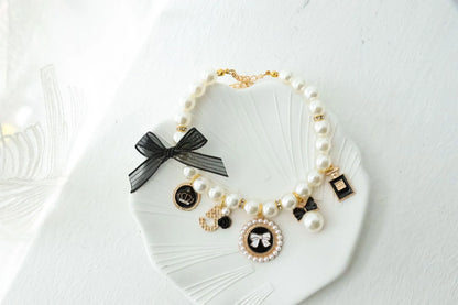 Black 4-PCS Pearl Charm Pet Necklace - Adjustable Bowknot Collar for Small Dogs & Cats (S: 20+5CM) - Image 3