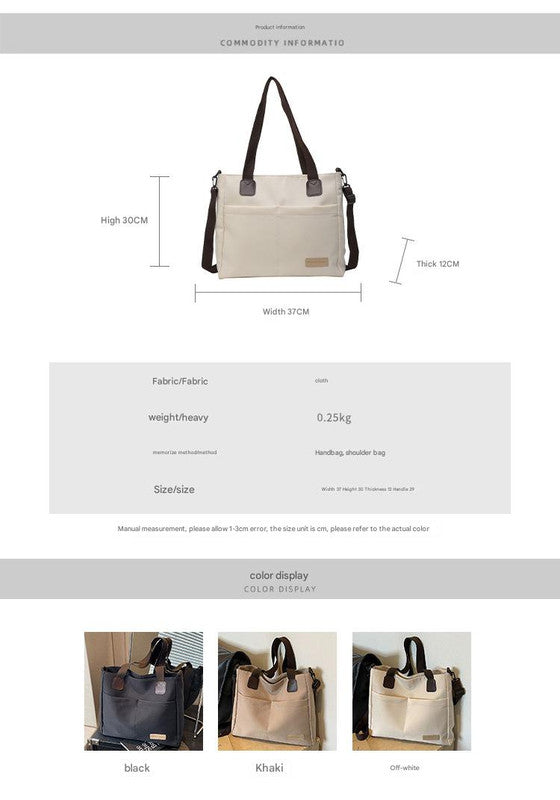 Stylish black canvas tote bag with detachable shoulder strap - Image 3