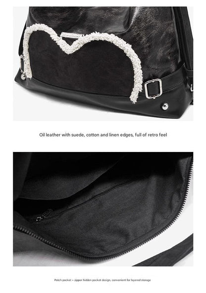 Stylish black tote backpack with heart embellishment - can be worn on one shoulder or as a backpack - Image 6