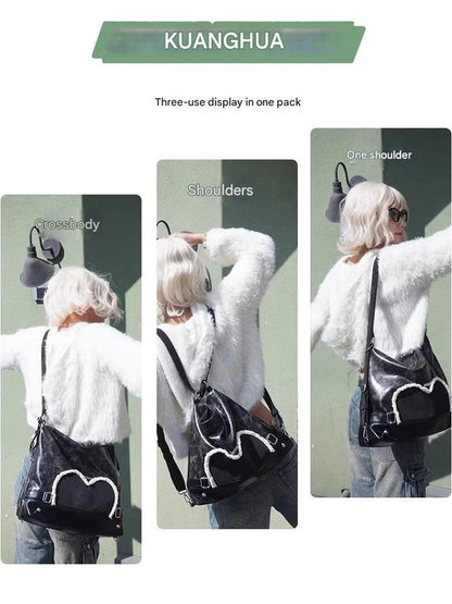 Stylish black tote backpack with heart embellishment - can be worn on one shoulder or as a backpack - Image 7