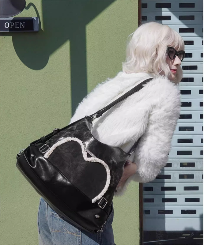 Stylish black tote backpack with heart embellishment - can be worn on one shoulder or as a backpack - Image 8