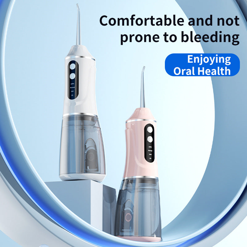 Portable Electric Oral Irrigator with 4 Nozzles 3 Pressure Modes - Pink - Image 5