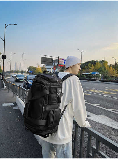 Black Unisex Travel Bag with Utility Buckles and Wet/Dry Compartments - Image 3