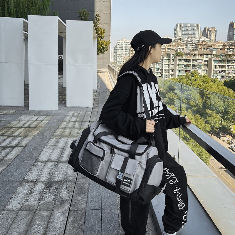 Grey Unisex Travel Bag with Utility Buckles and Wet/Dry Compartments - Image 2