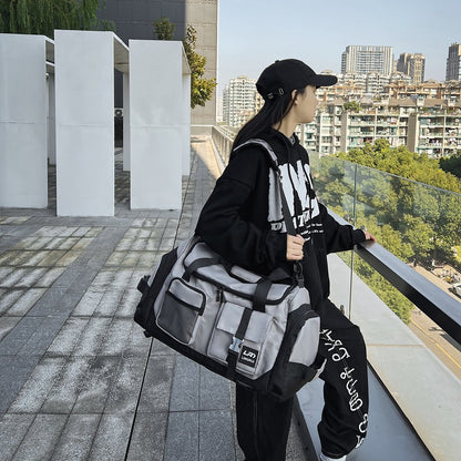 Grey Unisex Travel Bag with Utility Buckles and Wet/Dry Compartments - Image 2