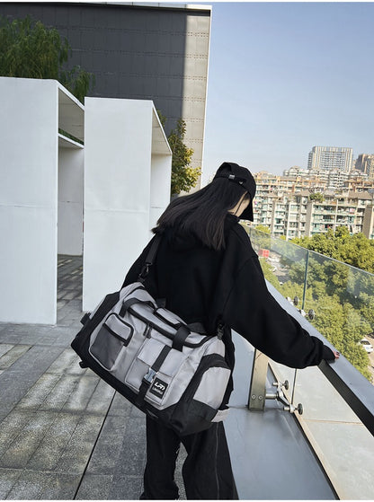 Grey Unisex Travel Bag with Utility Buckles and Wet/Dry Compartments - Image 4