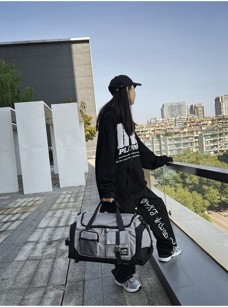 Grey Unisex Travel Bag with Utility Buckles and Wet/Dry Compartments - Image 5