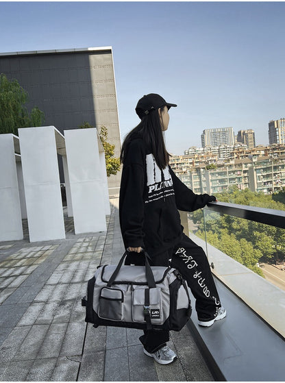 Grey Unisex Travel Bag with Utility Buckles and Wet/Dry Compartments - Image 5