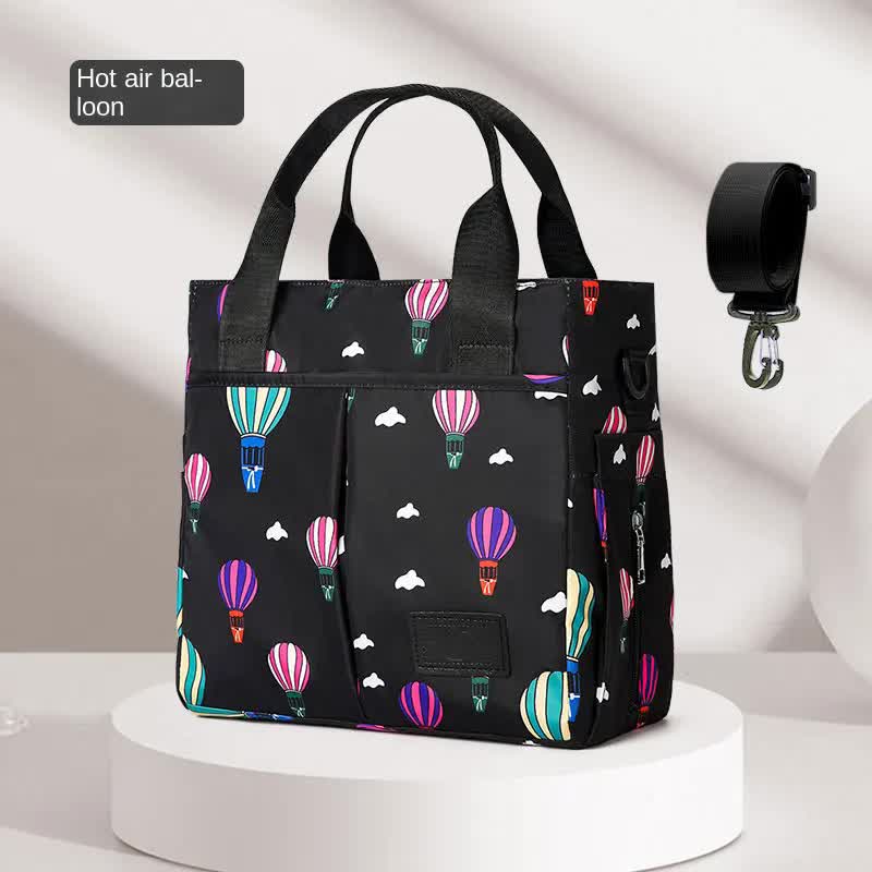 Black Versatile Nappy Bag Tote - Lightweight Diaper Bag with Insulated Pocket & Crossbody Strap - Image 2