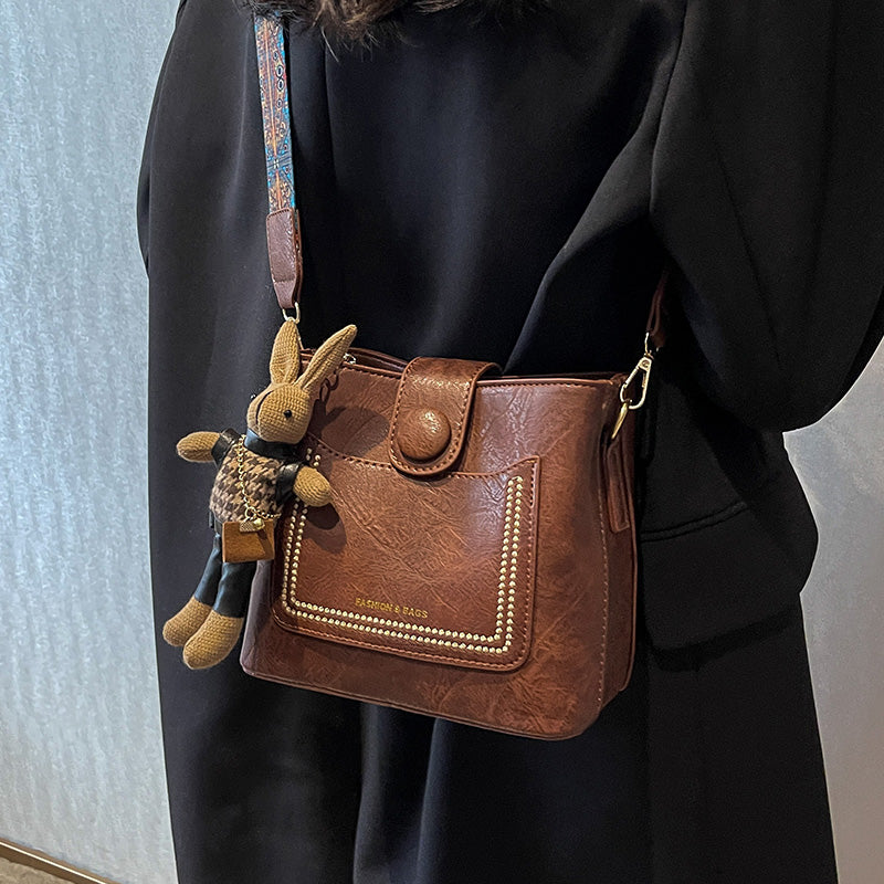 Vintage Style PU Leather Bucket Bag with Wide Patterned Strap & Optional Bunny Charm(black) - Image 2