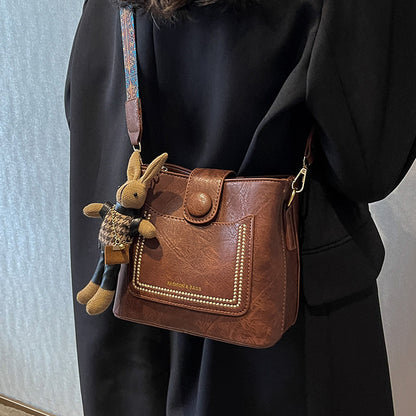 Vintage Style PU Leather Bucket Bag with Wide Patterned Strap & Optional Bunny Charm(red brown) - Image 2