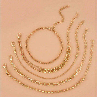 A golden six-piece set Chic Multi-Layered Alloy Bracelet Set - Fashionable Stackable Jewelry - Image 3