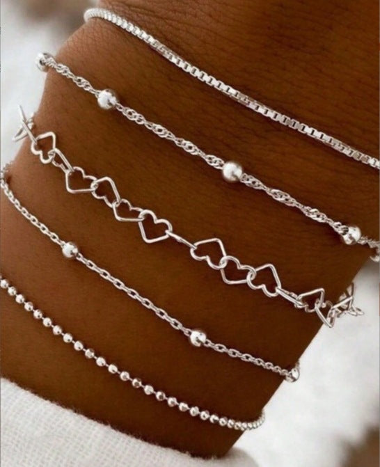 A Silver six-piece set Chic Multi-Layered Alloy Bracelet Set - Fashionable Stackable Jewelry - Image 2