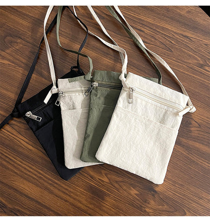 Black Minimalist Lightweight Nylon Crossbody Phone Bag - Compact & Stylish for Women - Image 3