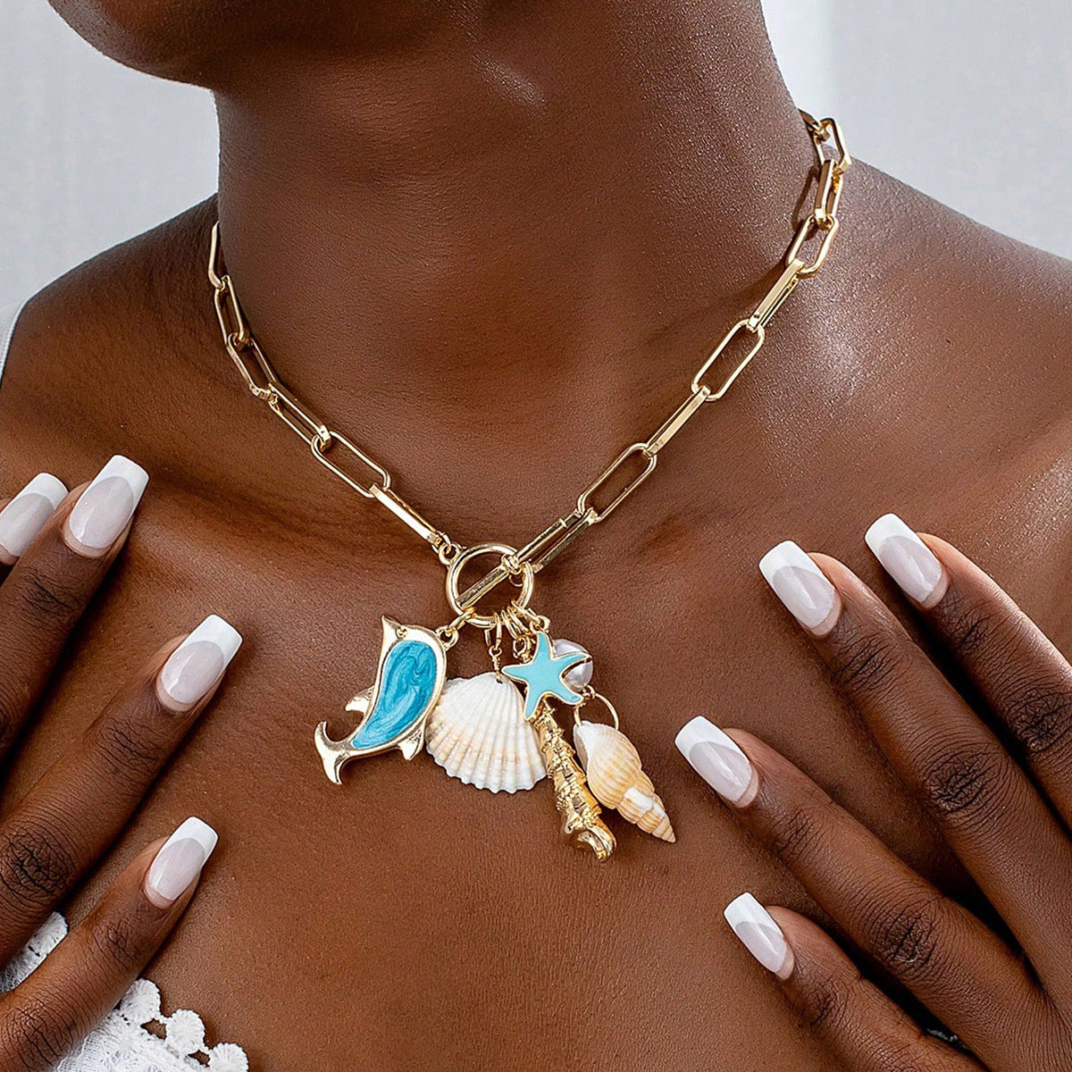 Gold Tone Paperclip Chain Toggle Necklace with Ocean Charms Dolphin Starfish and Seashell Pendant for Summer Beach Holiday - Image 2