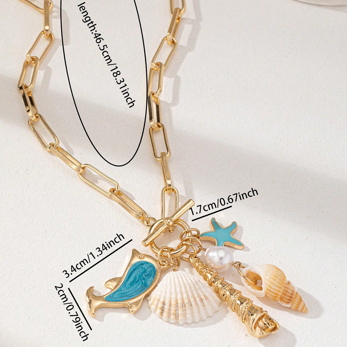 Gold Tone Paperclip Chain Toggle Necklace with Ocean Charms Dolphin Starfish and Seashell Pendant for Summer Beach Holiday - Image 3
