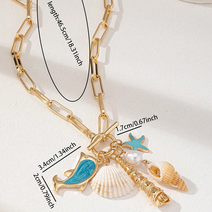 Gold Tone Paperclip Chain Toggle Necklace with Ocean Charms Dolphin Starfish and Seashell Pendant for Summer Beach Holiday - Image 3