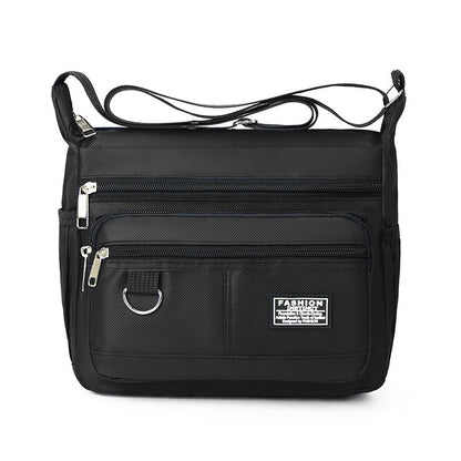 Black Men's Waterproof Oxford Cloth Crossbody Bag - Durable Anti-Theft Shoulder Backpack for Business, Travel & 10-inch Tablet