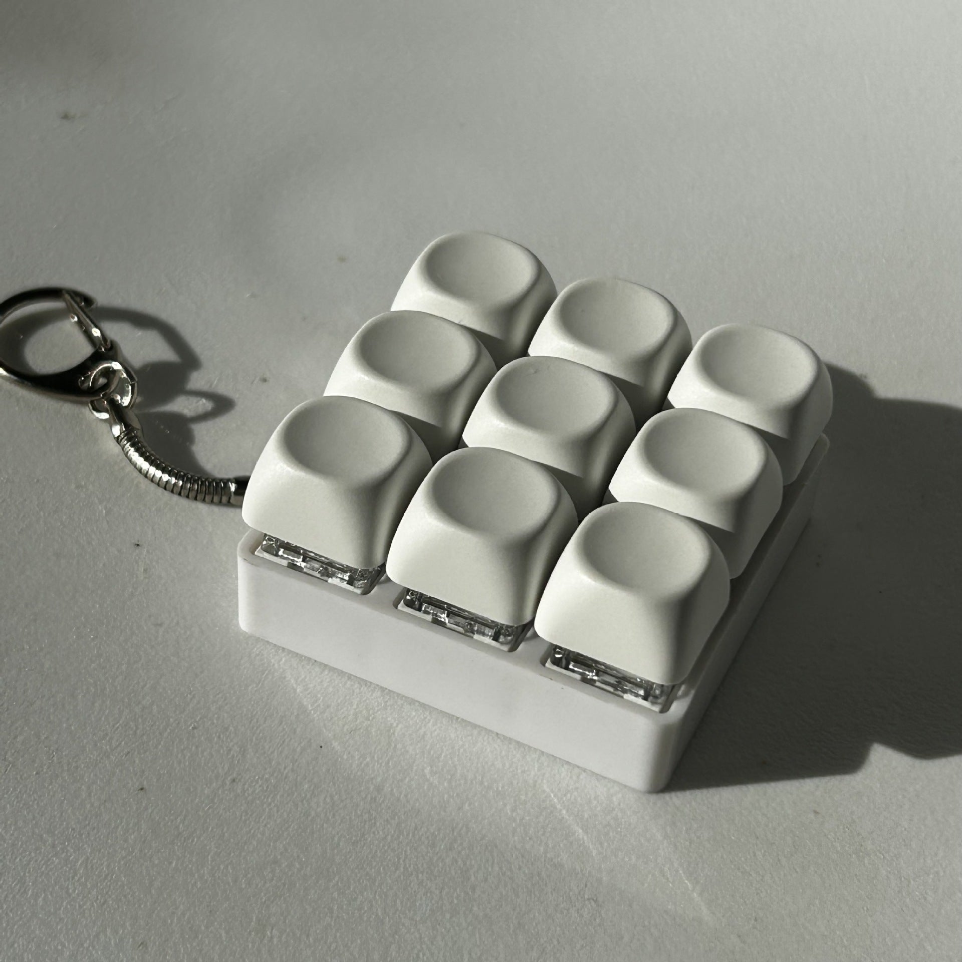 2-Pack White Mechanical 9-Keyboard Fingertip Toy Keychain - Key Pressure Relief, PVC Fingertip Toy