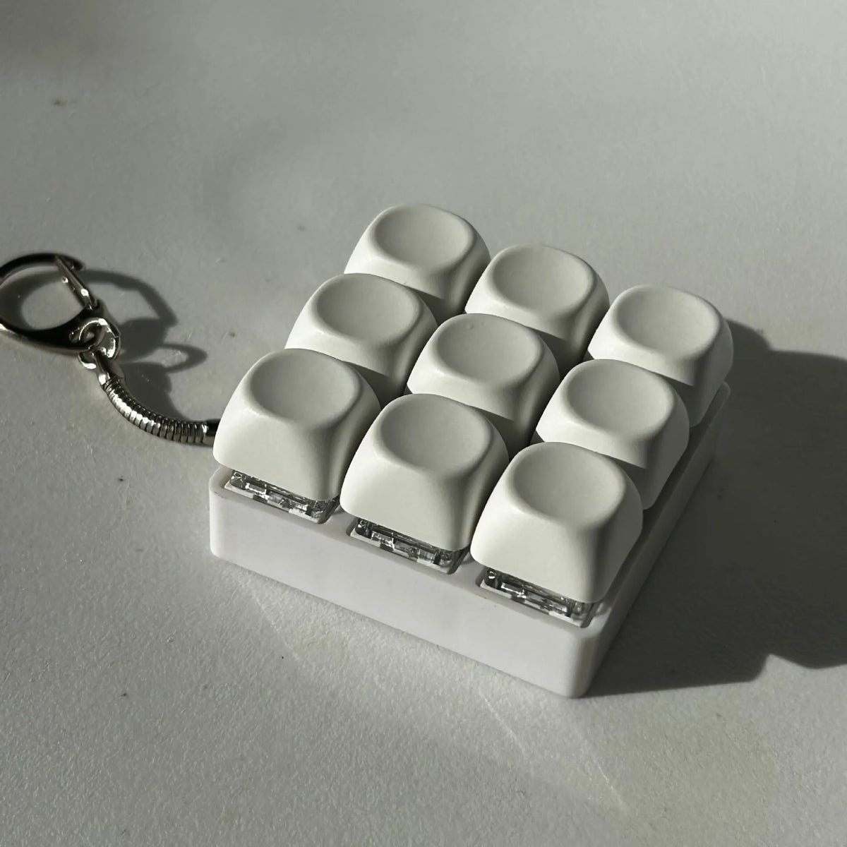 2-Pack White Mechanical 9-Keyboard Fingertip Toy Keychain - Key Pressure Relief, PVC Fingertip Toy