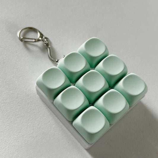 2-Pack Green Mechanical 9-Keyboard Fingertip Toy Keychain - Key Pressure Relief, PVC Fingertip Toy