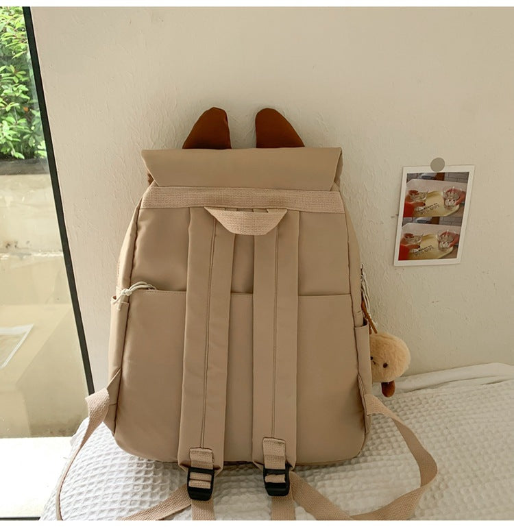 White Lightweight Nylon Waterproof Schoolbag for Children - Large Capacity Daypack with Ugly-Cute Cat Design - Image 3