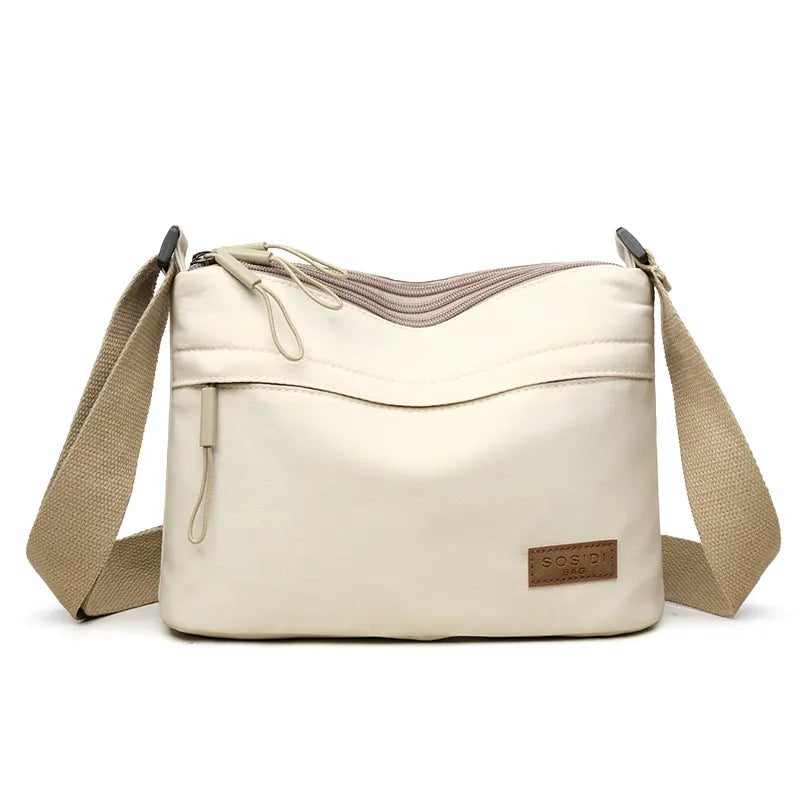 White Women Lightweight Nylon Crossbody Bag with Multiple Pockets Compact Shoulder Bag for Travel and Daily Essentials in Australia