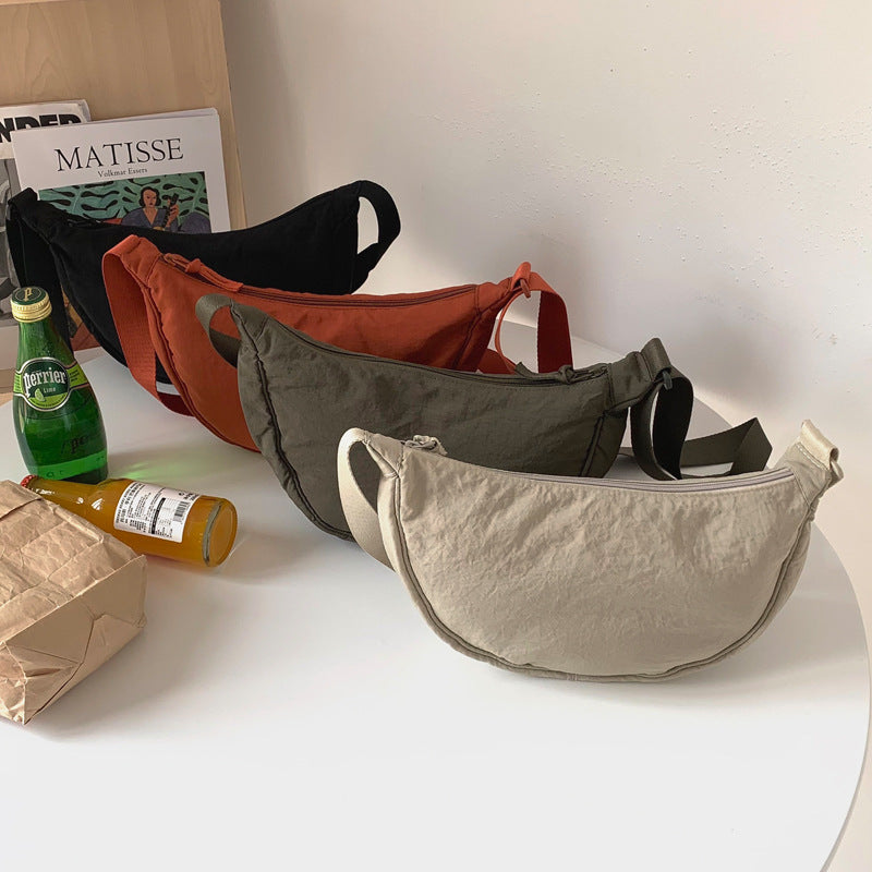 Orange Lightweight Nylon Crossbody Bag – Compact Saddle Style with Adjustable Strap for Everyday Use - Image 2