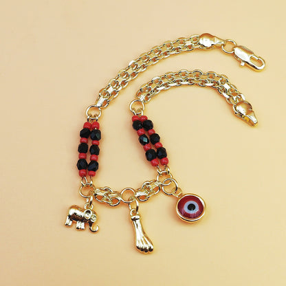 Gold-Tone Chain Bracelet with Red and Black Beads, Elephant Charm, Feather Pendant, and Round Stone Accent – 19 cm Length - Image 2