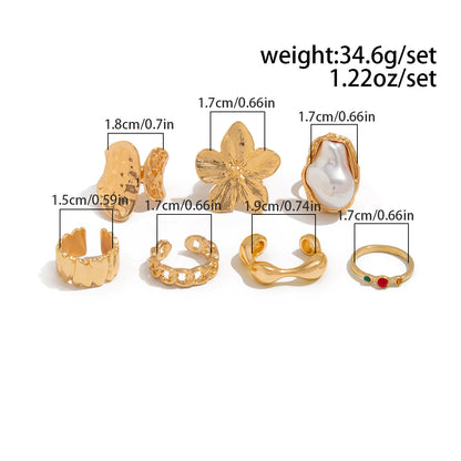 7-Piece Molten Gold Tone Ring Set - Baroque Faux Pearl, Flower, Chain Link & Abstract Shield Bands - Ultimate Adjustable Boho Stackable Jewellery - Image 2