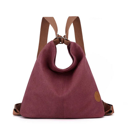 Purple Versatile 3-in-1 Canvas Backpack and Shoulder Bag Large Capacity Handbag for Women Ideal for Travel School and Everyday Use