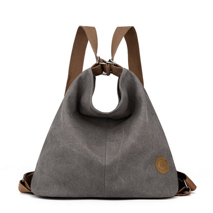 Grey Versatile 3-in-1 Canvas Backpack and Shoulder Bag Large Capacity Handbag for Women Ideal for Travel School and Everyday Use
